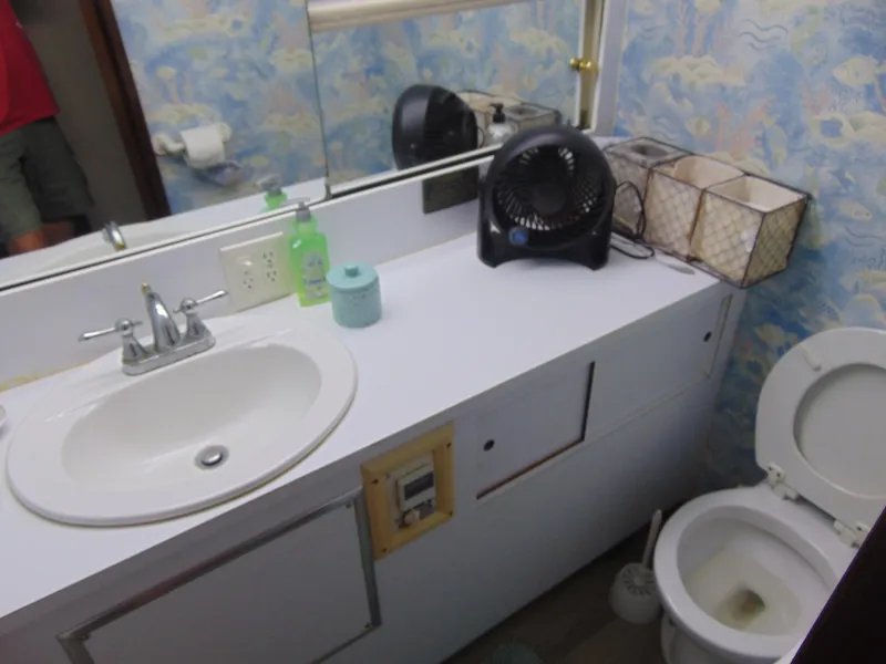 Slide: The Image of 1972 Hatteras Yachtfish kitchen with modern appliances and stylish cabinetry. - 20