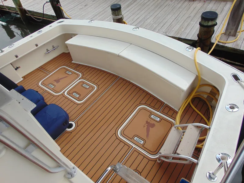 Slide: The Image of Interior of 1972 Hatteras Yachtfish with cozy seating and nautical decor. - 36