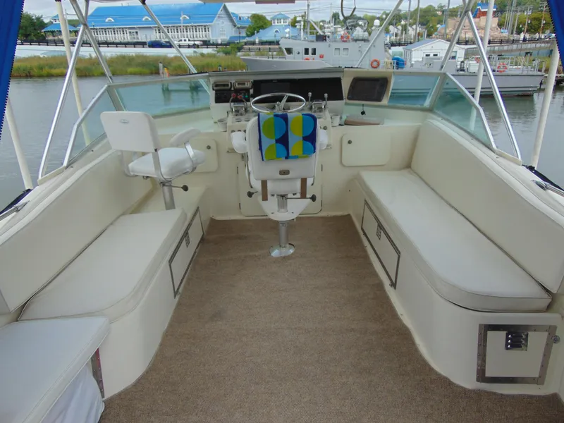 Slide: The Image of 1972 Hatteras Yachtfish kitchenette with sink and storage on deck. - 40