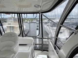 Slide: The Image of Interior view of 2007 Sea Ray 52 Sedan Bridge yacht at marina. - 10