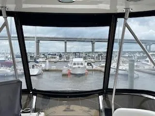 Slide: The Image of View from 2007 Sea Ray 52 Sedan Bridge, overlooking marina and bridge. - 12