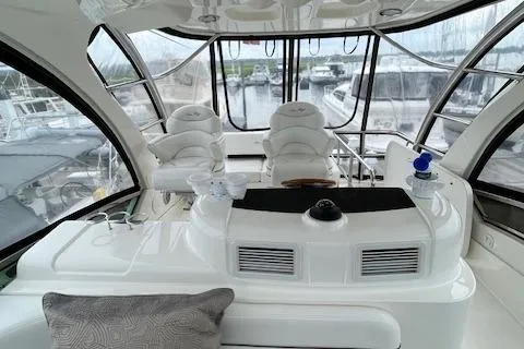 Slide: The Image of Luxurious 2007 Sea Ray 52 Sedan Bridge yacht interior with panoramic windows. - 19