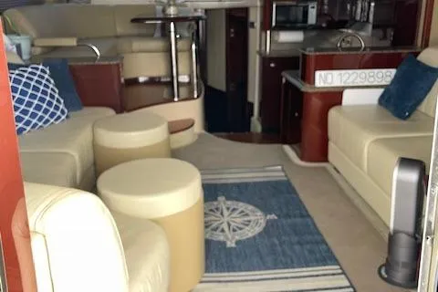 Slide: The Image of Luxurious interior of 2007 Sea Ray 52 Sedan Bridge yacht with modern furnishings. - 24