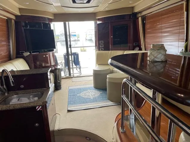 Slide: The Image of Luxurious 2007 Sea Ray 52 Sedan Bridge interior with modern amenities and elegant design. - 26
