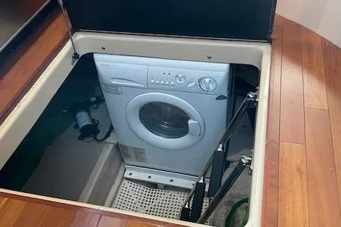 Slide: The Image of Washing machine in 2007 Sea Ray 52 Sedan Bridge yacht compartment. - 31
