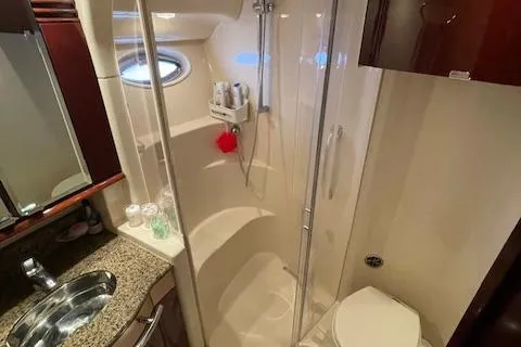 Slide: The Image of Luxurious bathroom in 2007 Sea Ray 52 Sedan Bridge yacht with shower and sink. - 36