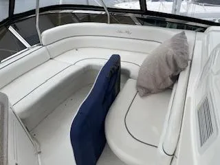 Slide: The Image of 2007 Sea Ray 52 Sedan Bridge interior with white seating and cushion. - 37