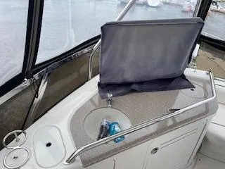 Slide: The Image of 2007 Sea Ray 52 Sedan Bridge yacht interior with sink and counter. - 38