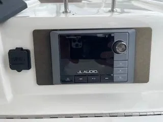 Slide: The Image of JL Audio system on 2007 Sea Ray 52 Sedan Bridge yacht dashboard. - 42