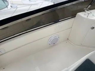 Slide: The Image of 2007 Sea Ray 52 Sedan Bridge interior with speaker and seating area. - 45