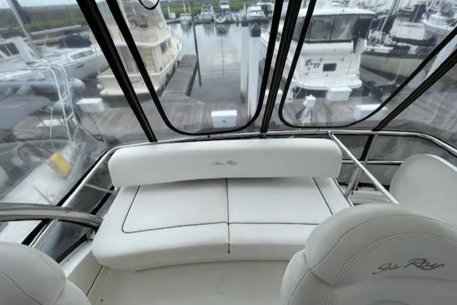 Slide: The Image of 2007 Sea Ray 52 Sedan Bridge interior with marina view. - 8