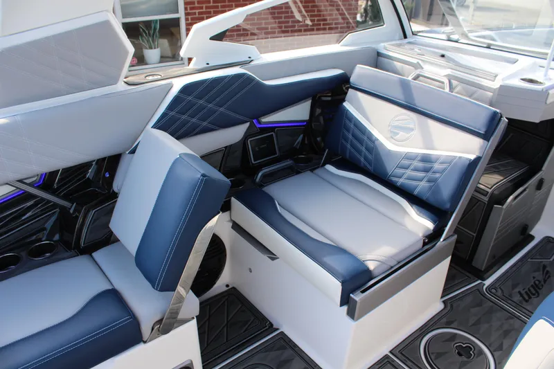 Slide: The Image of 2025 Tigé Ultré 25ZX interior with modern seating and sleek design. - 15
