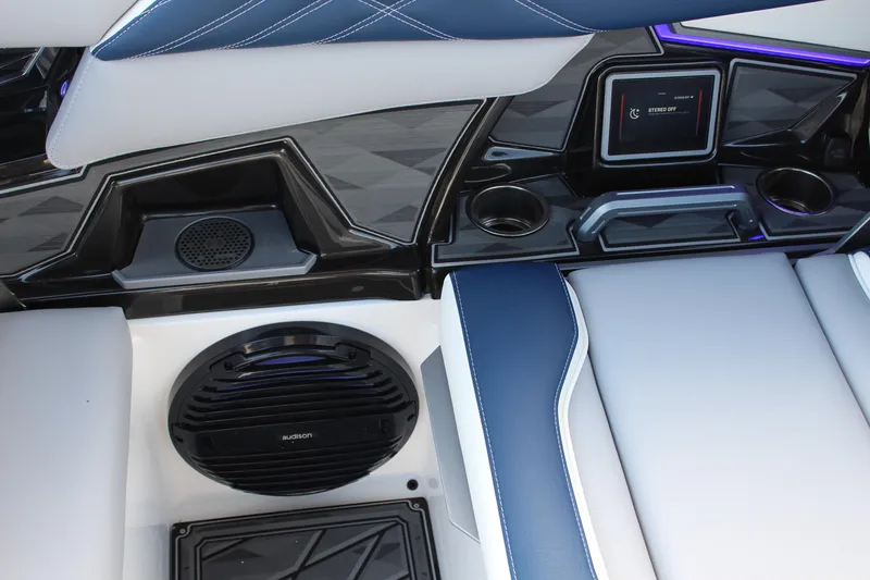 Slide: The Image of 2025 Tigé Ultré 25ZX interior with premium audio system and modern design. - 16