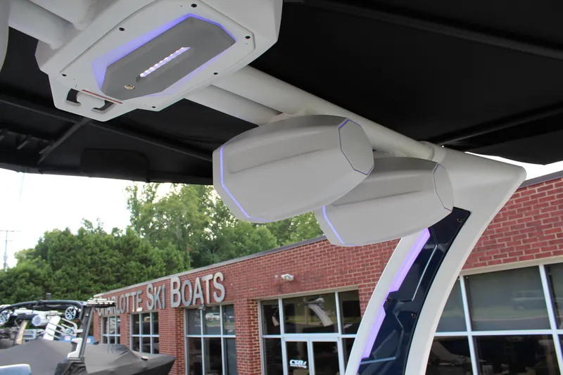 Slide: The Image of 2025 Tigé Ultré 25ZX boat speakers at Charlotte Ski Boats dealership. - 26