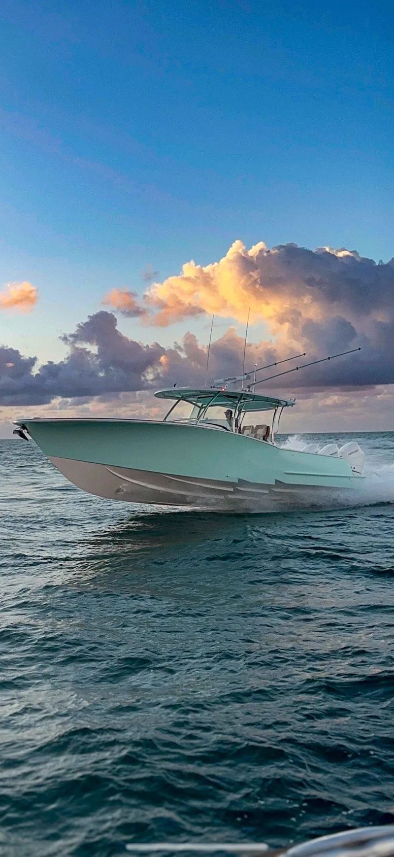 Slide: The Image of Control panel of 2026 Mag Bay 38 CC boat with advanced navigation and system displays. - 18