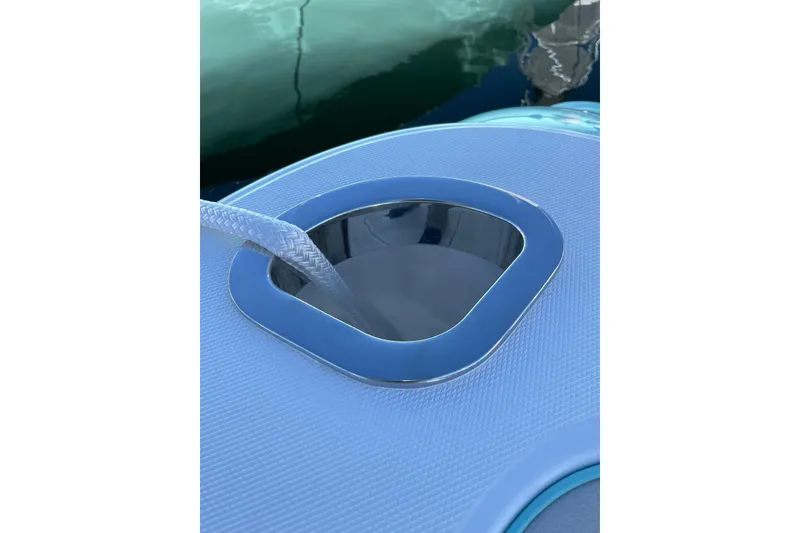 Slide: The Image of Close-up of a shiny metal hinge on a 2026 Mag Bay 38 CC boat. - 36