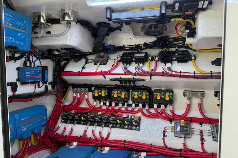 Slide: The Image of Electrical system of 2026 Mag Bay 38 CC boat, featuring organized wiring and components. - 41