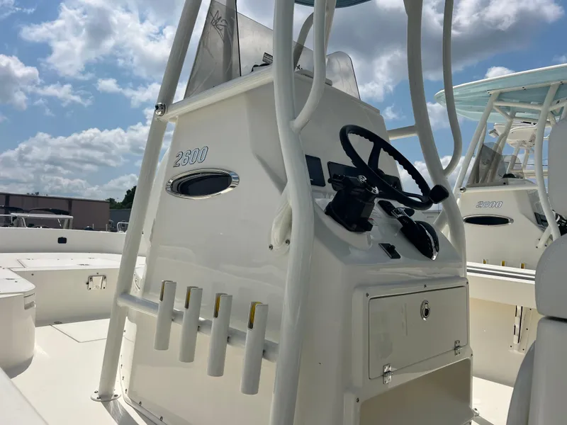 Slide: The Image of 2025 Pathfinder 2600 TRS boat console under a sunny sky. - 8