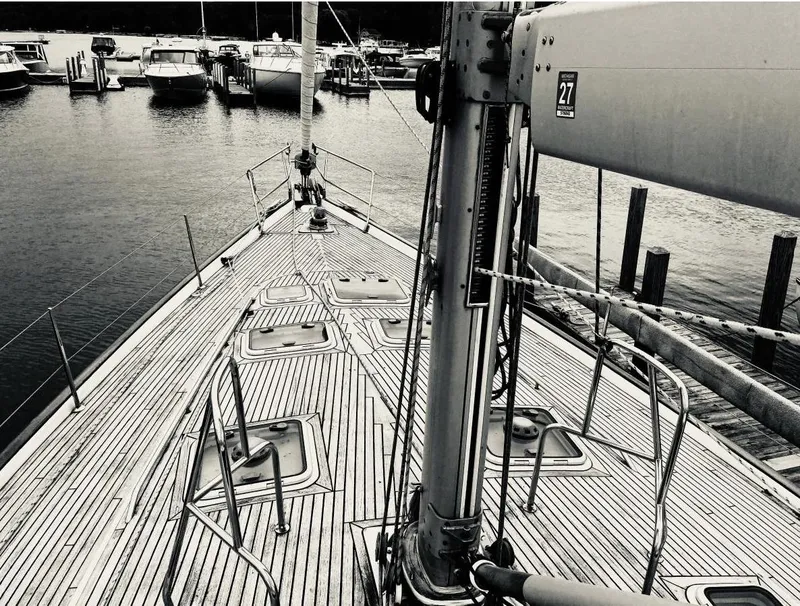 Slide: The Image of Beneteau Oceanis Clipper 523 sailboat deck, 2007 model, docked in a marina. - 13