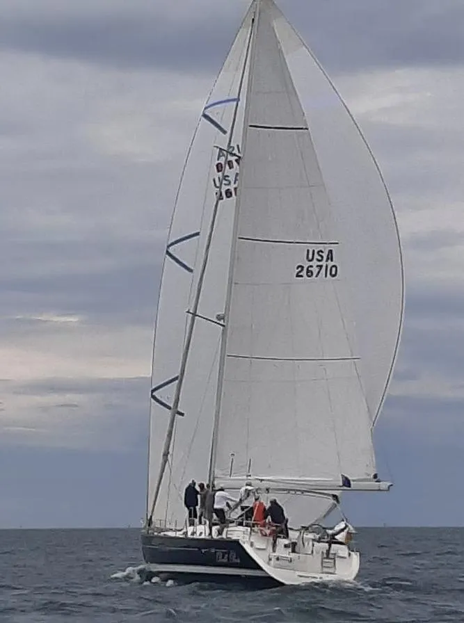 Slide: The Image of Sailing yacht Beneteau Oceanis Clipper 523, 2007 model, on open sea under cloudy skies. - 3