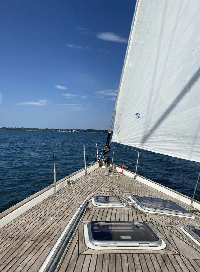 Slide: The Image of Sailing on a 2007 Beneteau Oceanis Clipper 523 with clear skies and calm waters. - 4