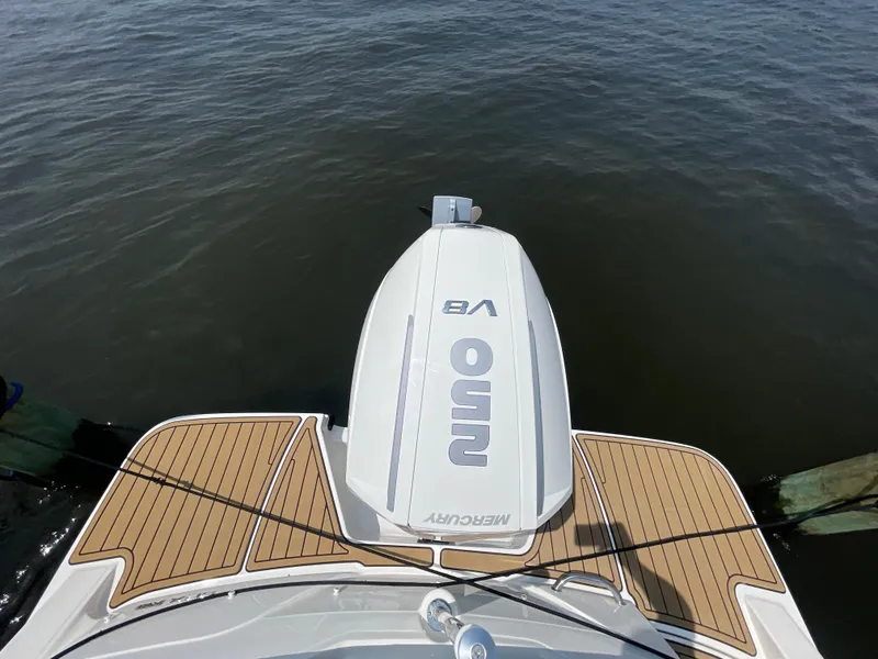 Slide: The Image of 2023 Sea Ray SPX 230 Outboard with Mercury engine on water. - 35