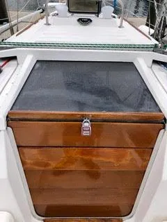 Slide: The Image of 1984 Hunter 31 sailboat with wooden hatch and lock. - 17