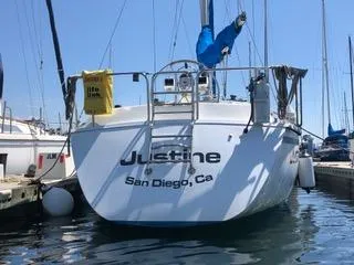 Slide: The Image of 1984 Hunter 31 sailboat named Justine docked in San Diego marina. - 18