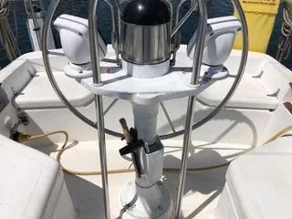 Slide: The Image of Cockpit of 1984 Hunter 31 sailboat with steering pedestal and navigation instruments. - 22