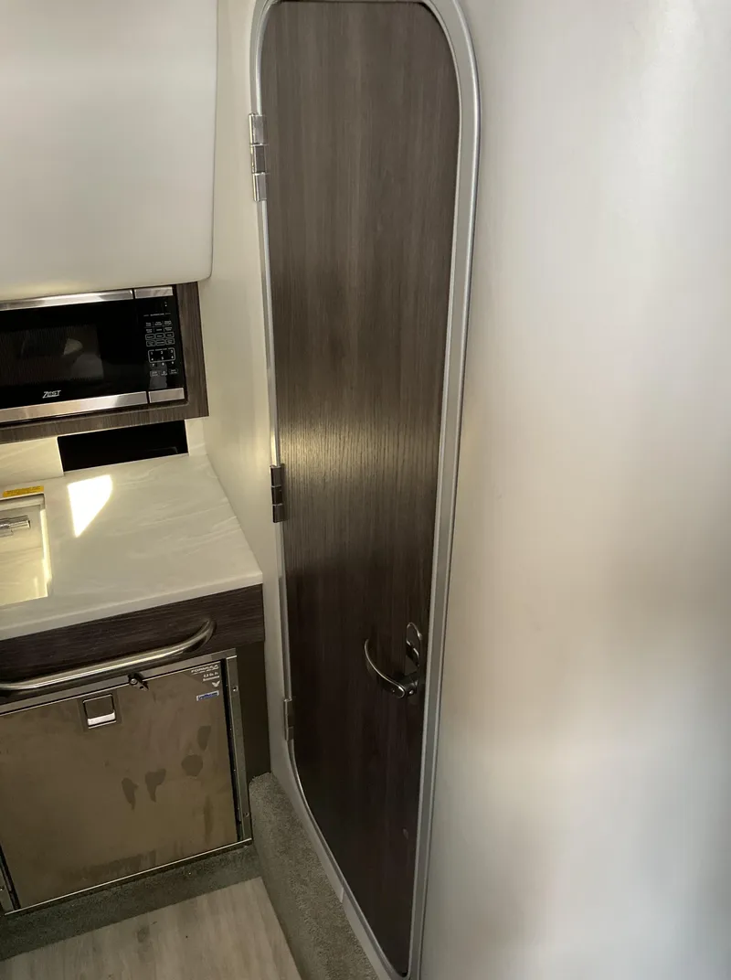 Slide: The Image of Interior of 2022 Formula 350 Crossover Bowrider I/O with sleek cabinetry and modern design. - 18