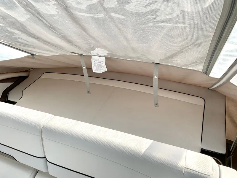 Slide: The Image of 2022 Formula 350 Crossover Bowrider I/O with covered seating area. - 31