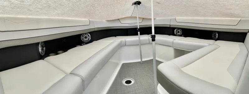 Slide: The Image of 2022 Formula 350 Crossover Bowrider I/O interior with spacious seating and modern design. - 40