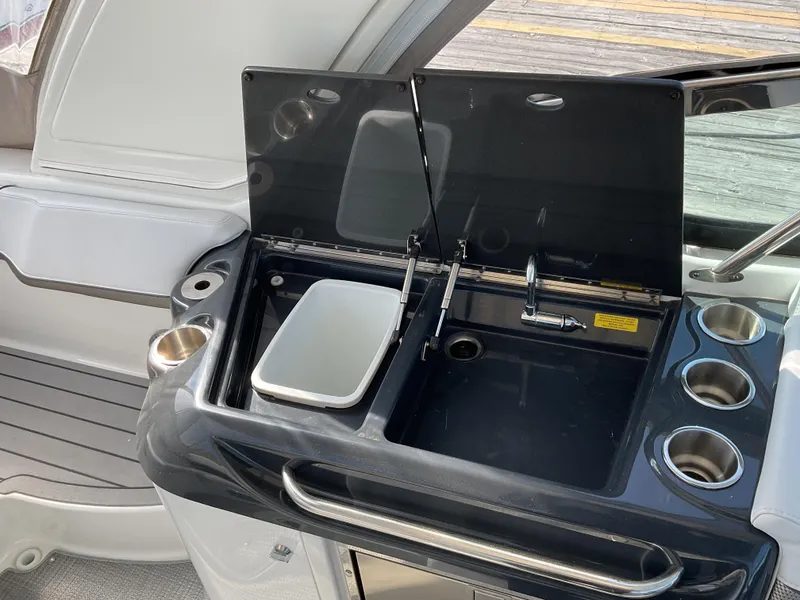 Slide: The Image of 2022 Formula 350 Crossover Bowrider I/O boat sink and counter area. - 41