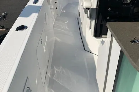 Slide: The Image of 2025 Wellcraft 352 Fisherman boat interior, sleek white deck design. - 14