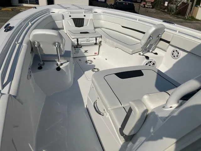 Slide: The Image of 2025 Wellcraft 352 Fisherman boat interior with seating and storage compartments. - 15