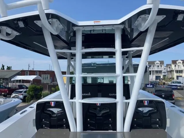 Slide: The Image of 2025 Wellcraft 352 Fisherman boat with advanced Garmin navigation system. - 18