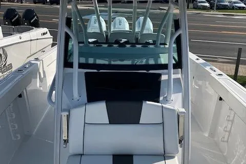 Slide: The Image of 2025 Wellcraft 352 Fisherman boat interior with seating and console view. - 19