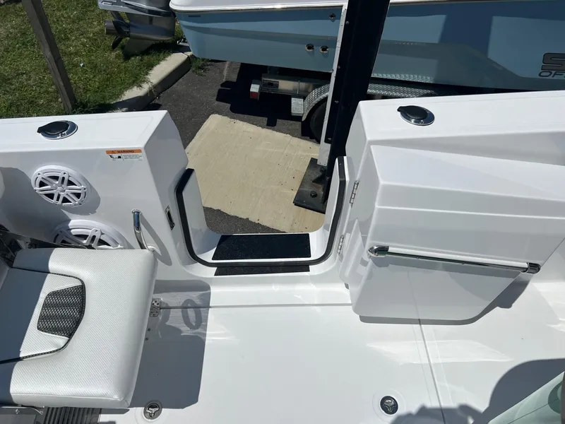 Slide: The Image of 2025 Wellcraft 352 Fisherman boat interior with seating and speakers. - 28