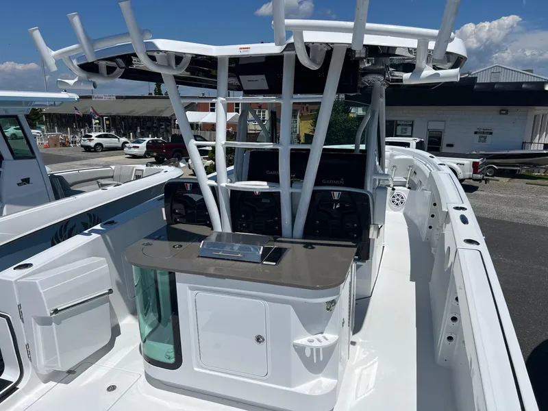 Slide: The Image of 2025 Wellcraft 352 Fisherman boat interior with modern console and seating. - 32