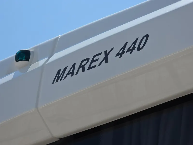 Slide: The Image of Marex 440 boat exterior with model name, 2026. - 27
