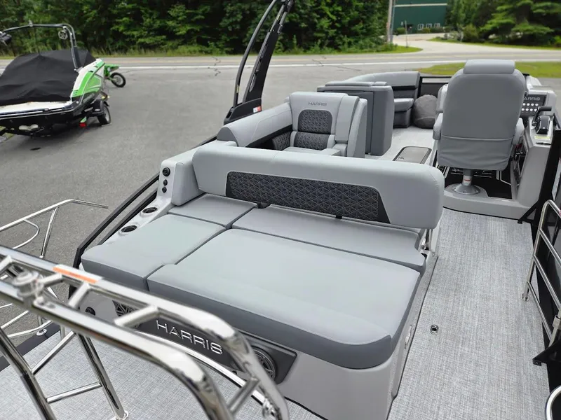 Slide: The Image of 2025 Harris Solstice 230 pontoon boat with luxurious gray seating and modern design. - 5