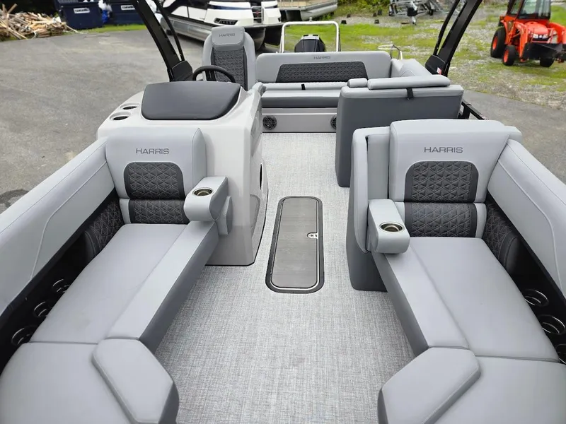 Slide: The Image of 2025 Harris Solstice 230 boat interior with gray seating and modern design. - 9