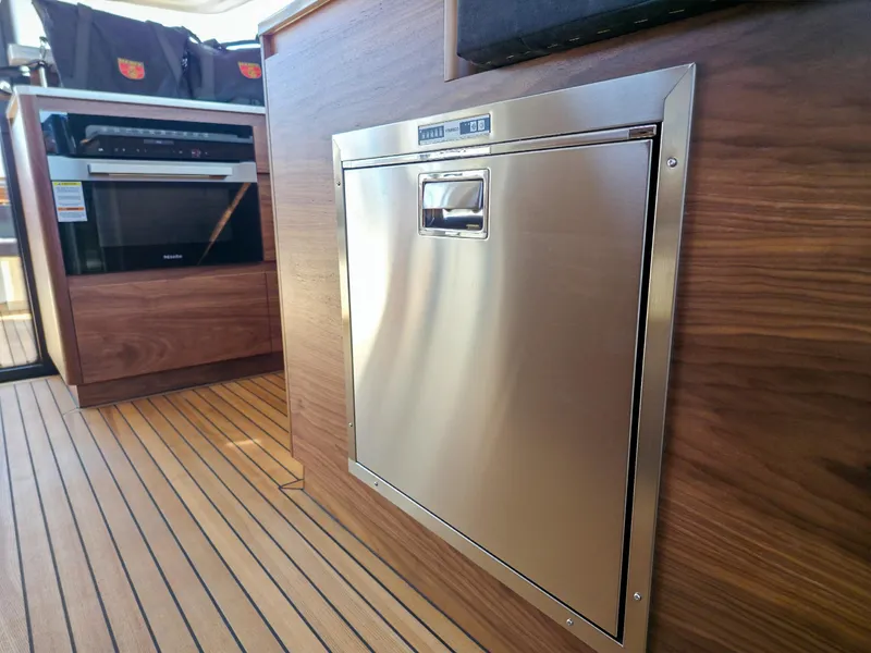 Slide: The Image of Modern kitchen interior on 2026 Marex 440 yacht with stainless steel appliances. - 42