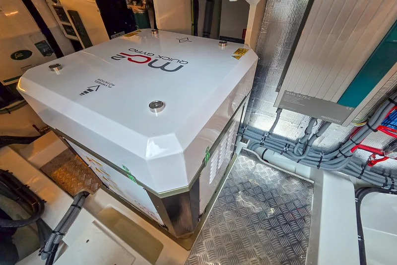 Slide: The Image of Engine room of 2026 Marex 440 boat with modern equipment and wiring. - 89