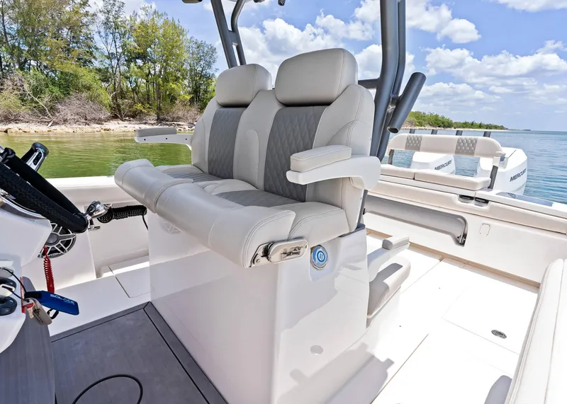 Slide: The Image of Luxury seating on 2025 Solace 32 CS boat, featuring plush upholstery and modern design. - 36