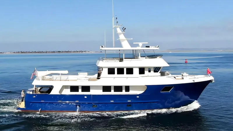 Slide: The Image of 2018 Allseas Expedition yacht cruising on calm blue waters. - 2