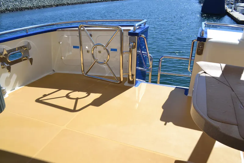 Slide: The Image of Allseas Expedition 2018 yacht deck with railing and water view. - 27