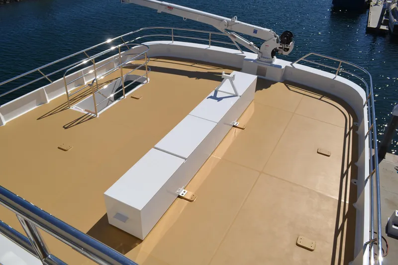 Slide: The Image of Allseas Expedition 2018 yacht deck with railing and crane, docked at marina. - 29