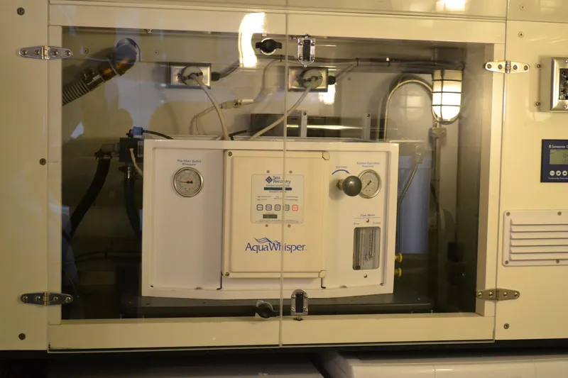 Slide: The Image of Aqua Whisper water filtration system in Allseas Expedition, 2018 model, enclosed in a protective casing. - 38