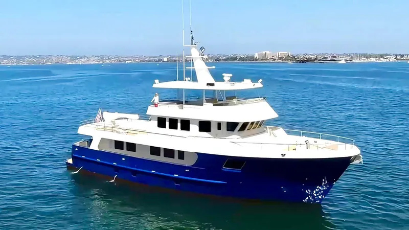 Slide: The Image of 2018 Allseas Expedition yacht on calm blue waters, clear sky in the background. - 6